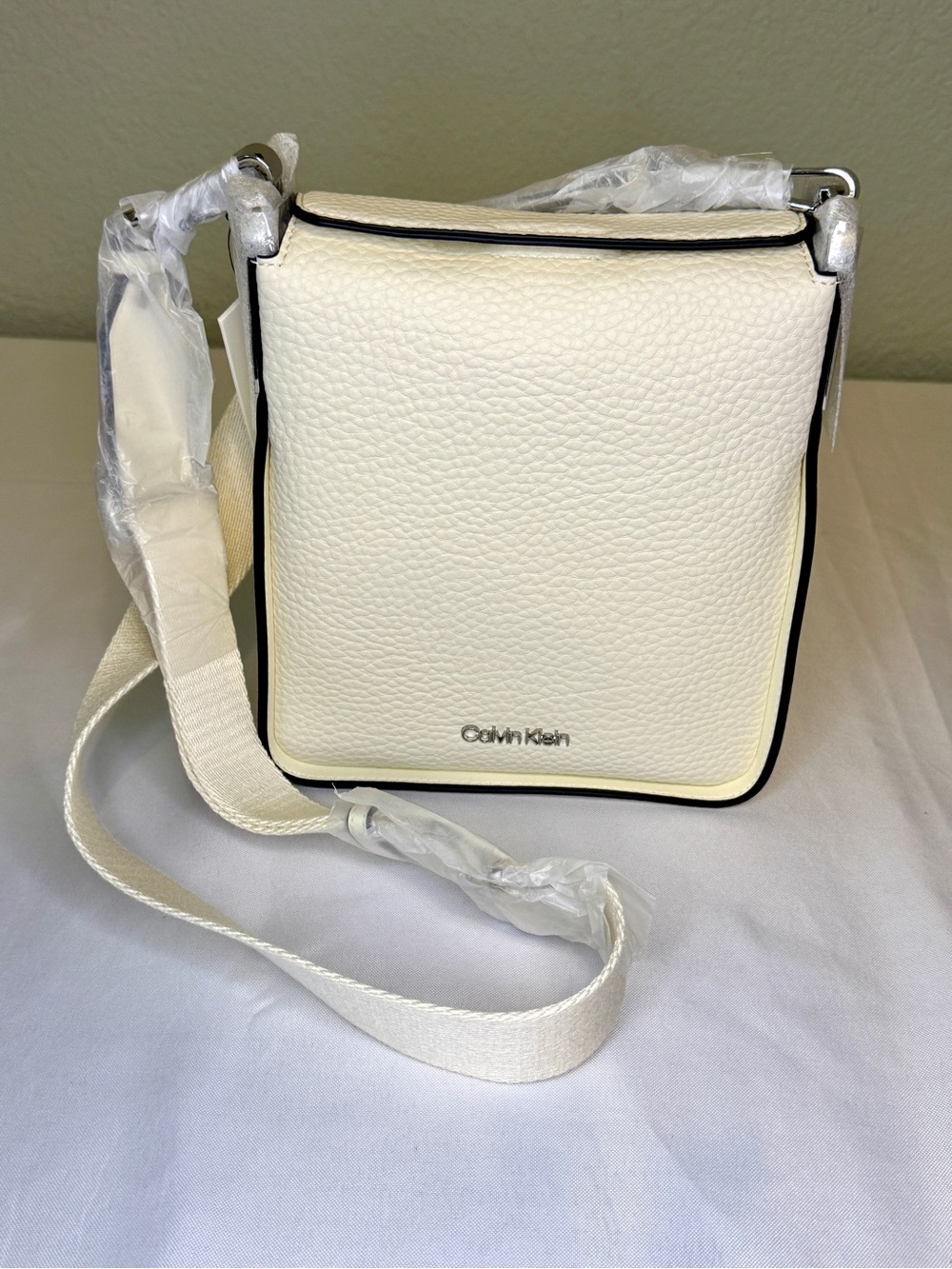 Calvin Klein Cream Pebbled Crossbody with Black Trim